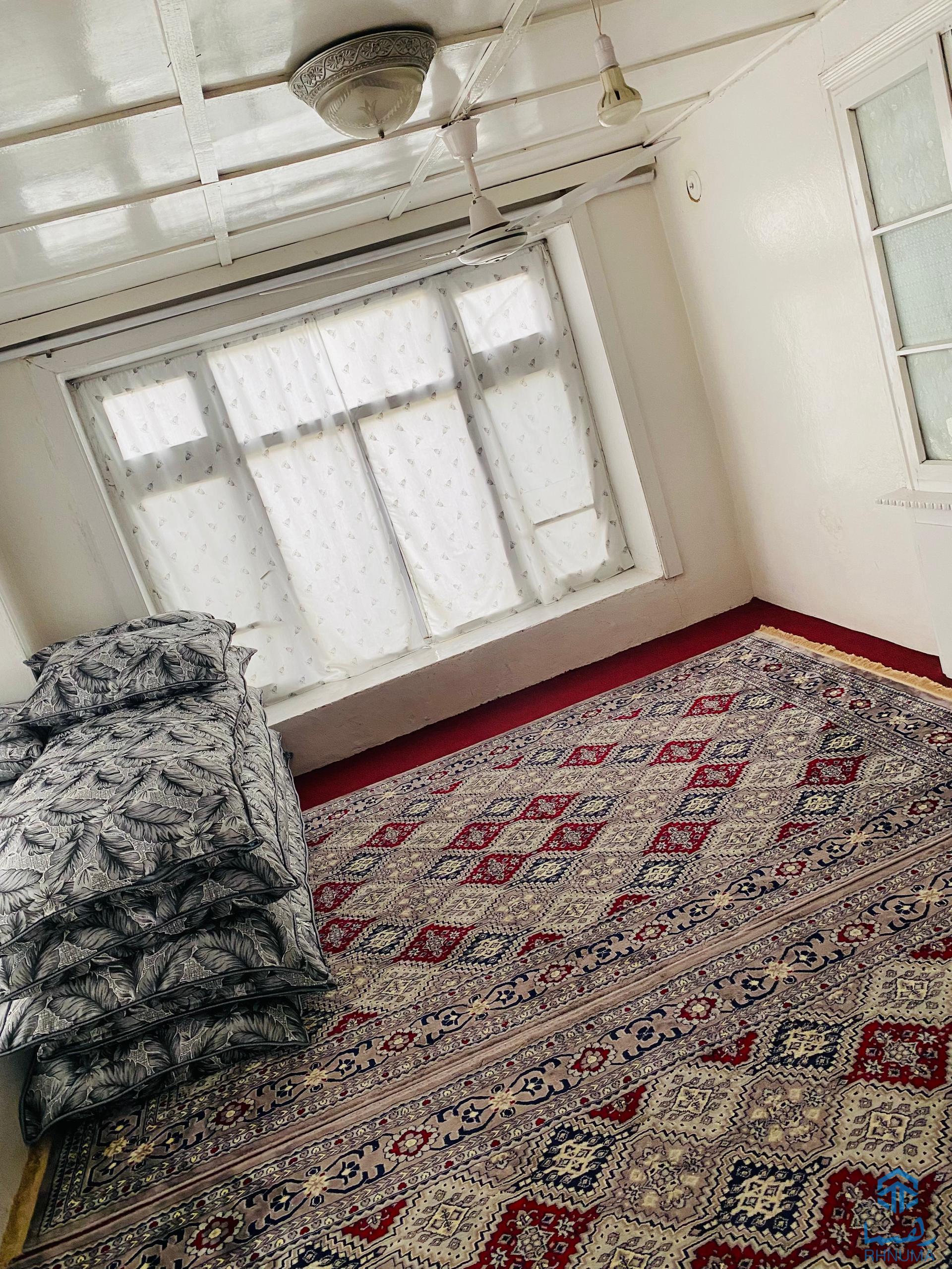 یک تعمیر حویلی دار دو منزله کرایی